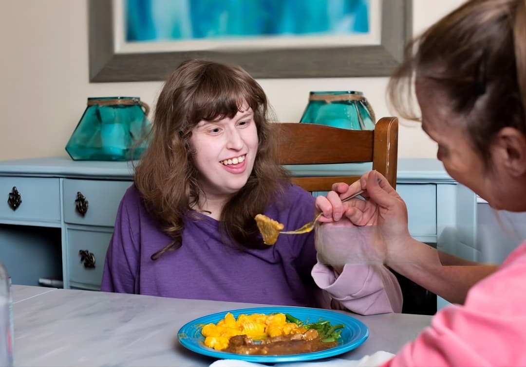 Support worker helping an adult with a learning disability in Sheffield