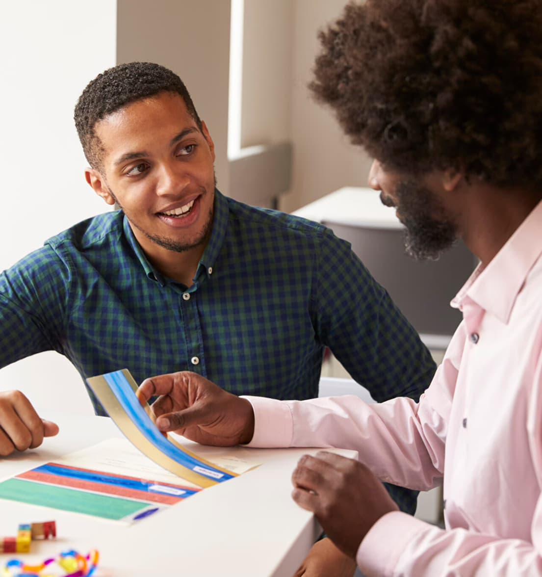 Two people discussing home care funding options in Sheffield